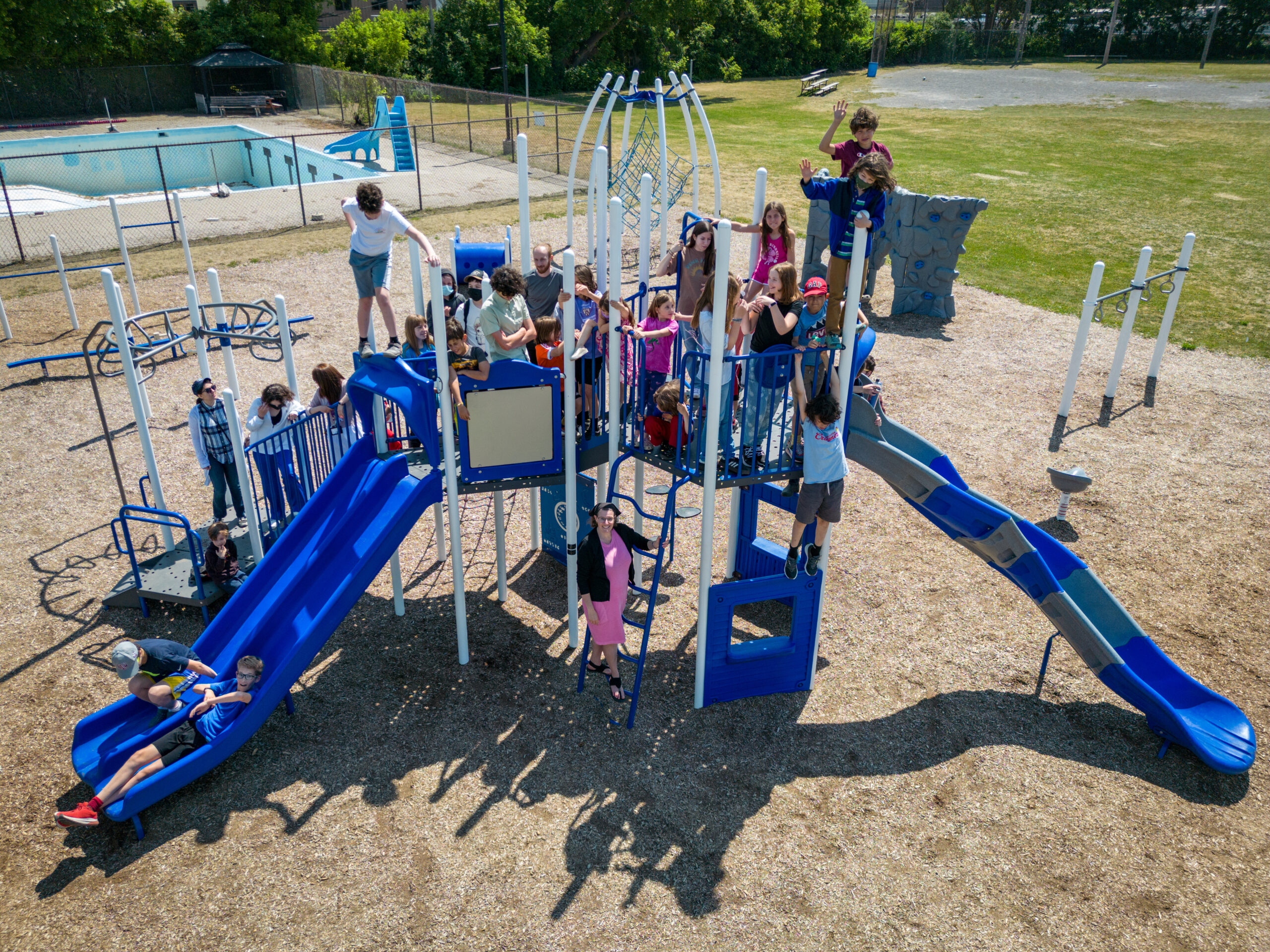 Image showing students celebrating on a play structure.